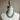 Necklace displayed on a mannequin bust with a label reading 'Wolf Form Co.'