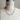 Brody gray and Brody champagne pearl necklaces layered together on a bust