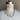 Claudia white and gray baroque pearl necklaces layered together on a bust