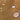 Water droplets on a textured brown surface
