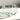 Clear glass bowl with floral etching on a white surface