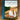Book titled 'The Ranch Table' by Elizabeth Poetti on a wooden surface