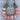 Colorful yarn-wrapped horseshoe on a wooden surface