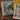 Colorful children's books on a wooden surface with educational toys.