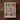 The Biggest Story Bible Storybook by Kevin Deyoung and Don Clark, featuring a colorful, hand-drawn style cover illustration, photographed flat on a rustic wooden surface with a pink ribbon bookmark visible.