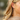 Woman wearing Ryan gold filled teardrop hoop earring