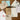 Collection of stationery items including cards and envelopes on a wooden surface